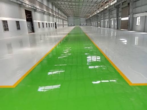 Industrial flooring project with marked corridor